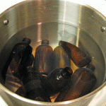 Amber Glass Bottles Soaking in Salt Water